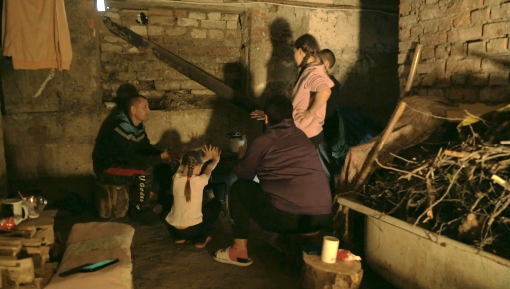 Family keeping warm in Ukraine. Donate to Ukraine.